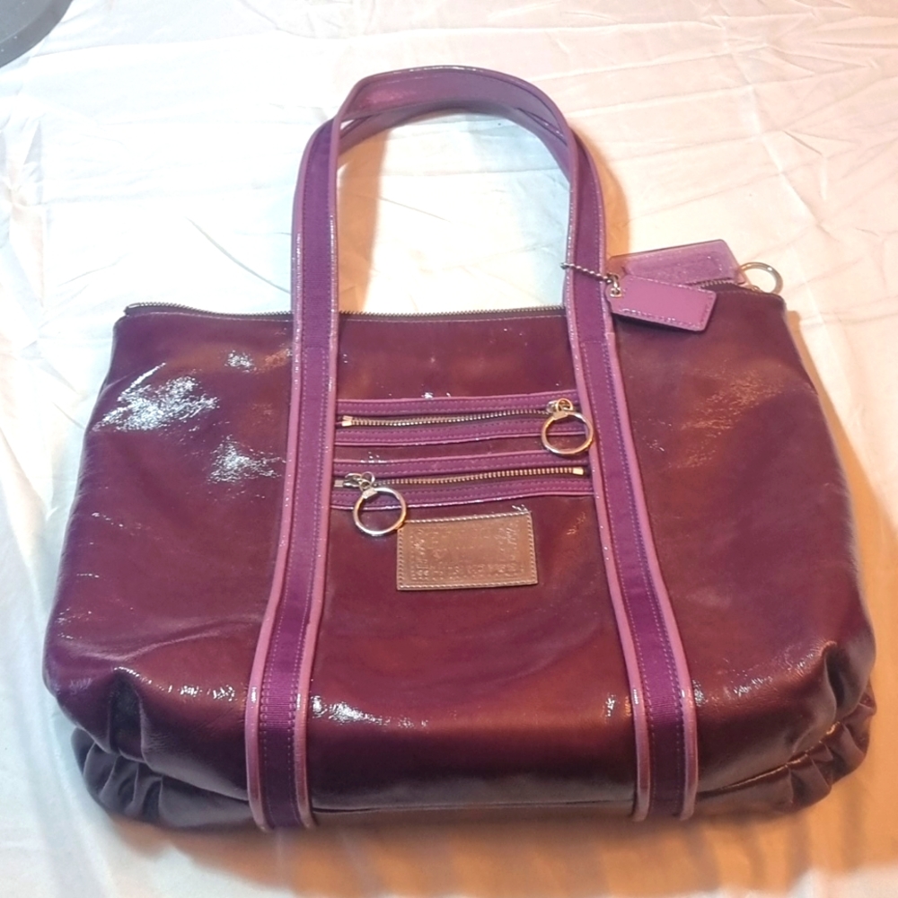 Coach poppy pursepurple with pink interior